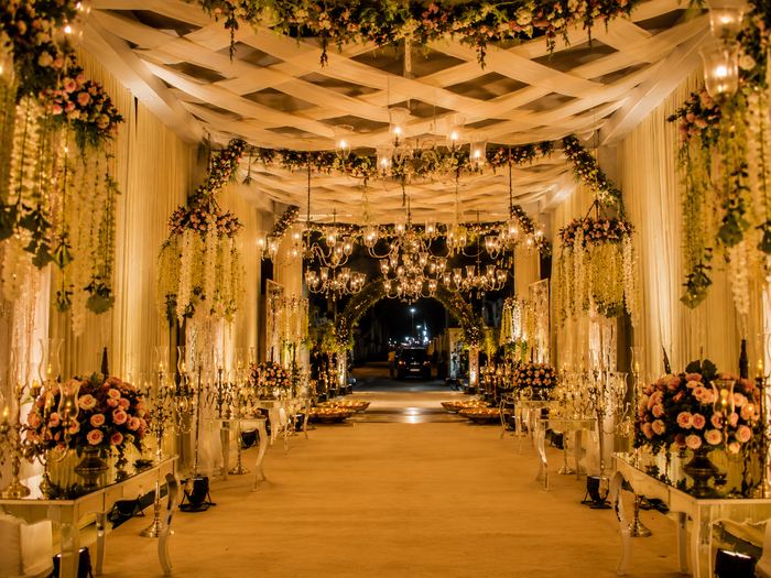 Wedding decor reference with regal seating and warm ceremonial lighting